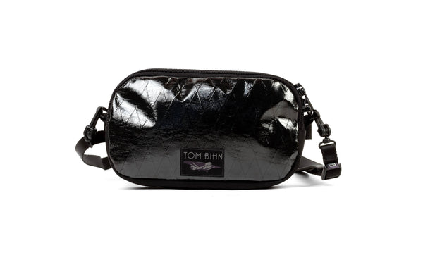 The Bantam in Reverse Black X-Pac® with  a shoulder strap